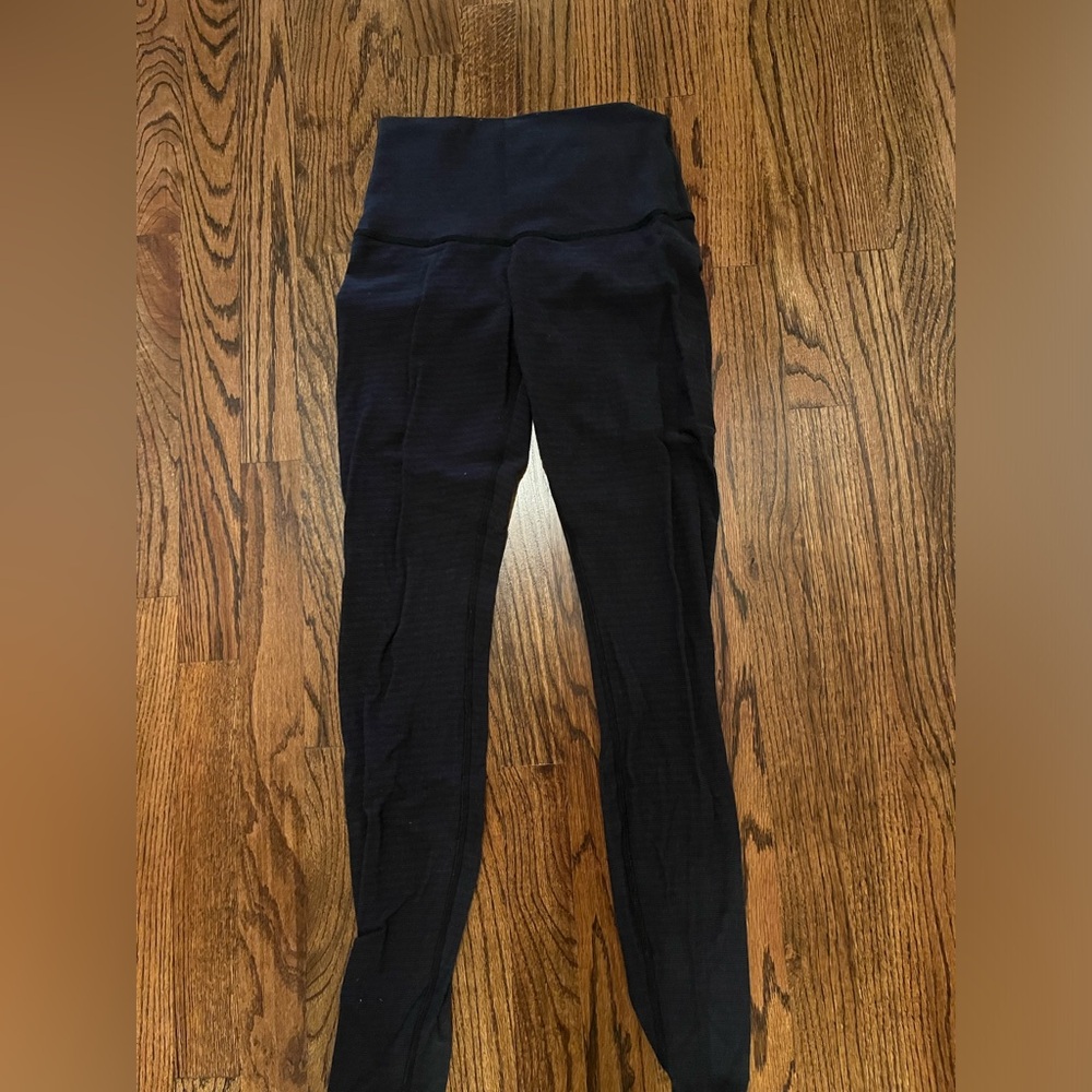lululemon navy tights worn few times. great condition herringbone knit